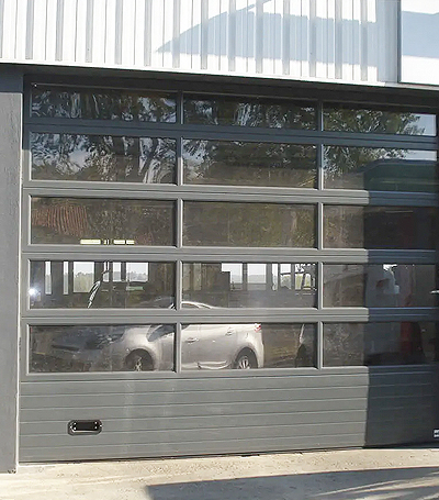 Portes de garage sectionnelle sur mesure pour batiments commerciaux et garage dans les Yvelines - La Fermeture Parisienne.