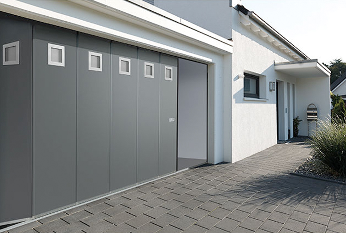 Portes de garage sectionnelles sur-mesure - Fabricant TUBAUTO