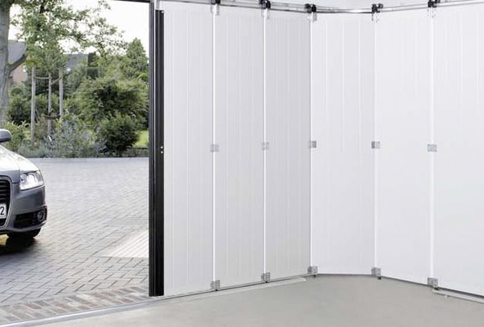 Pose de portes de garage sectionnelles latérales  sur mesure en aluminium à Plaisir  - La Fermeture Parisienne - Yvelines